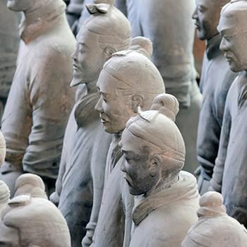 stone statues of chinese men from ancient cultures studied in the archaeology program at Trent university