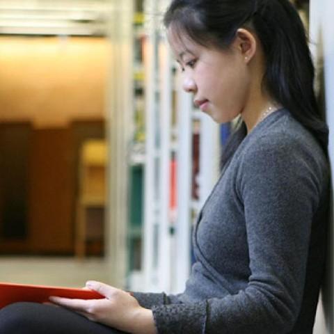 A Champlain student studying in the Bata Library