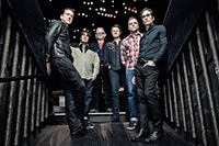 Biography photograph of the Blue Rodeo Band at night