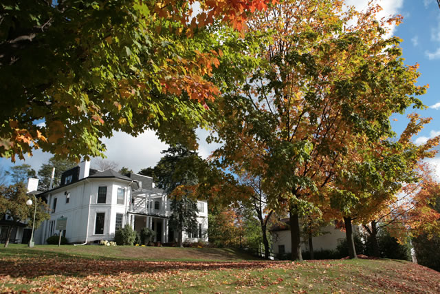 Exterior of trail college in the fall around mid-day