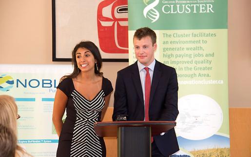 Andressa Lacerda, Trent Ph.D. candidate and COO, Noble Purification Inc, and Adam Noble, CEO, Noble Purification Inc, at the announcement at Gzowski College on August 26.