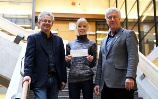 Maddie Trottier is presented with the James S. Miller Memorial Scholarship by orests Ontario CEO Rob Keen and Dr. Stephen Bocking, chair of the Environmental and Resource Studies/Science program at Trent