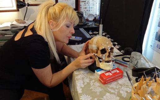 Forensic artist Diana Trepkov performing craniofacial reconstruction