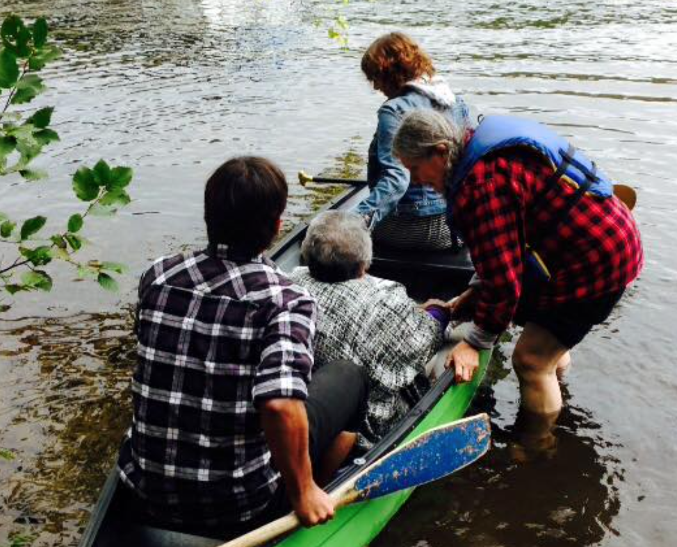 Elder Shirley Williams with students in Canoe