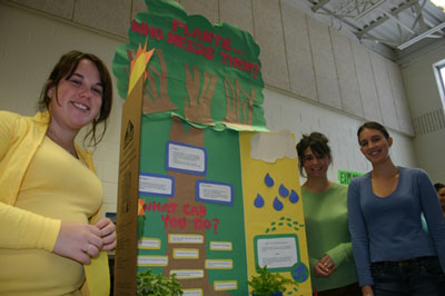 Photo 2: (l-r) Jamie Boone, Melissa Wharran and Jessica Jeffery with their exhibit Plants ... Who Needs Them?