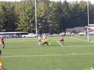 Trent Women's Soccer team in action agains Queen's Golden Gaels