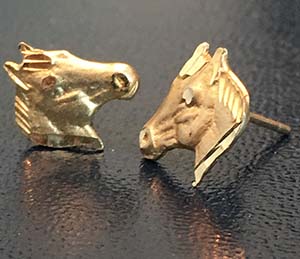 two gold earrings