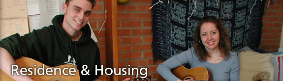 Residence & Housing - Two students playing guitar