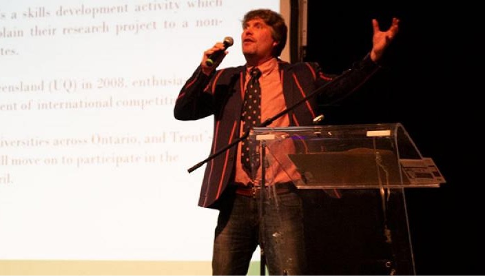 man speaking on stage