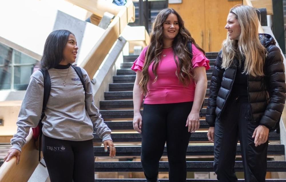 students walking down stairs