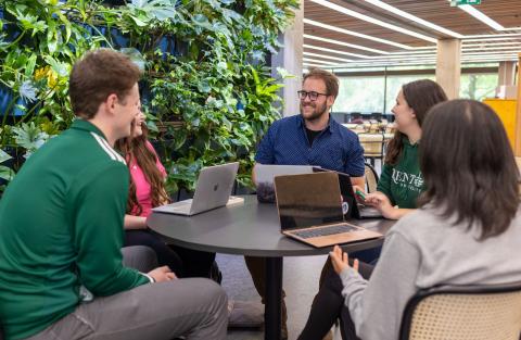 students gathering in library 