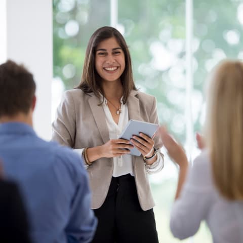 Photo of a lecturer getting applause