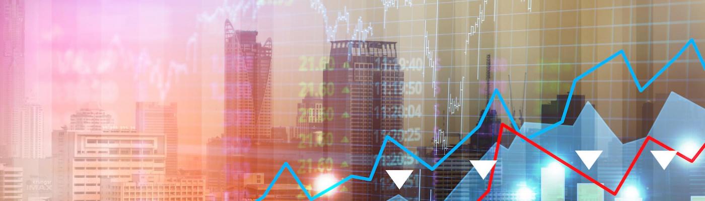 A city with a graph overlaid showing stock market data