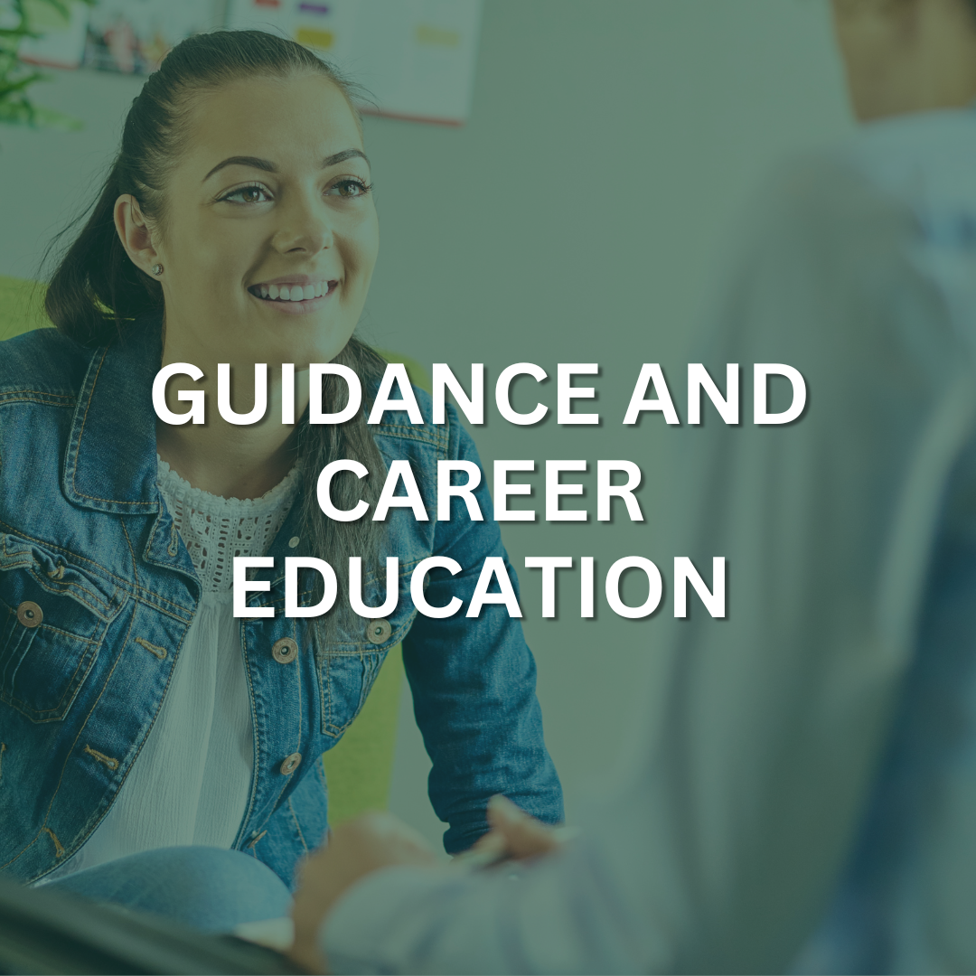 A woman is smiling at someone across a desk