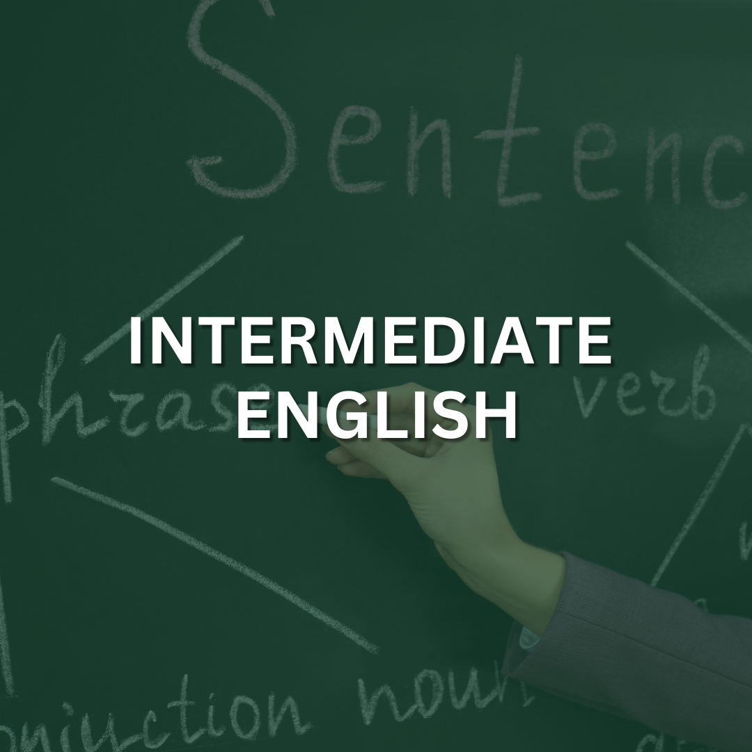 A hand holding a piece of chalk over a blackboard with the words 'Sentences' and 'Phrases' written on it