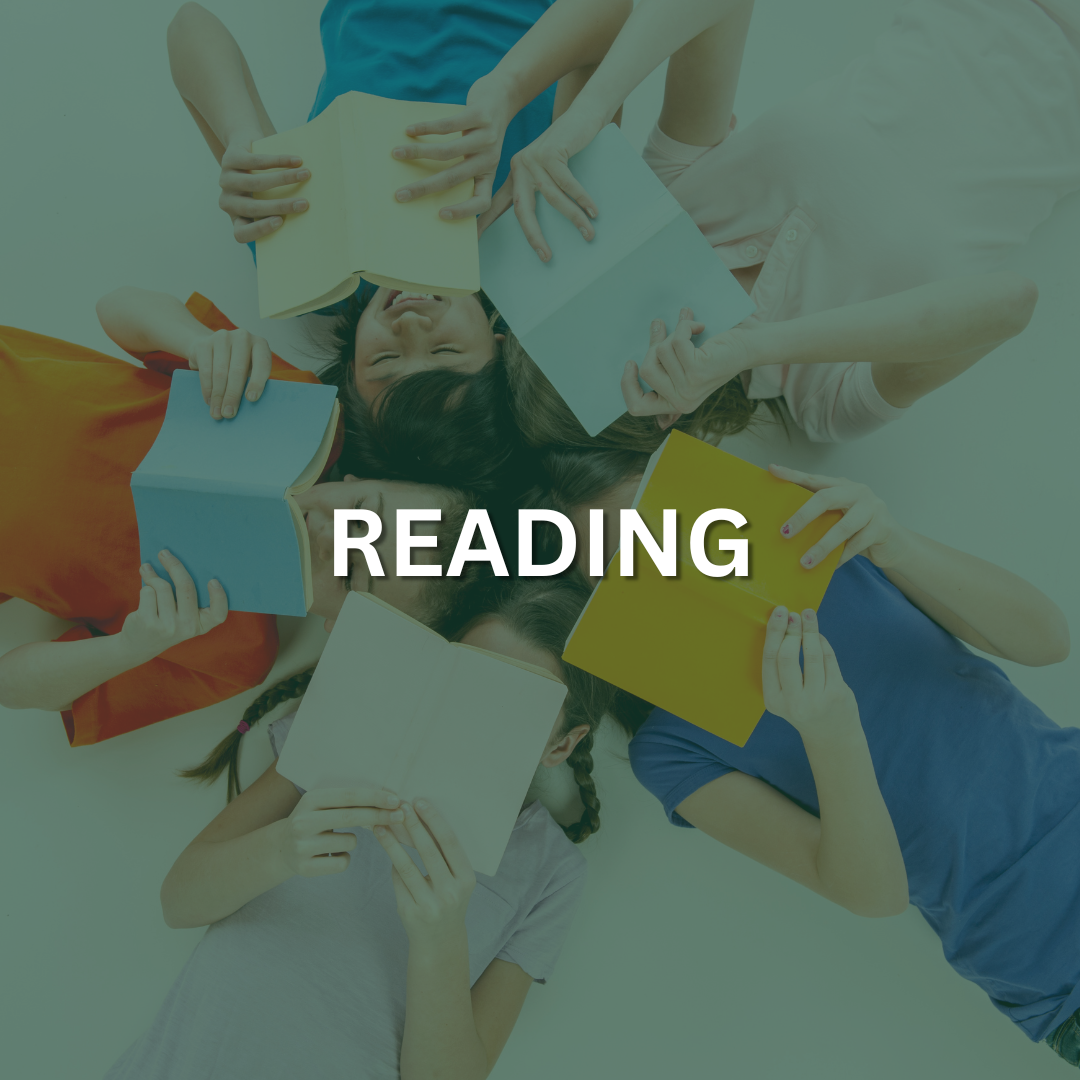 Five adolescent students are laying on the floor with books in their hands
