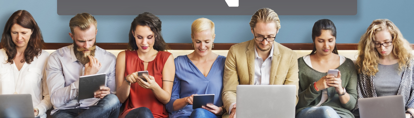 Seven adult learners are registering online using electronic devices