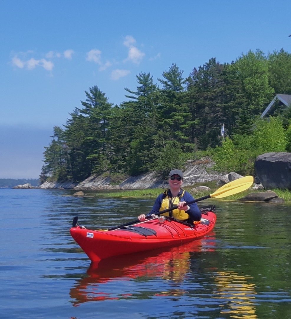 Student in kayak in marine environment
