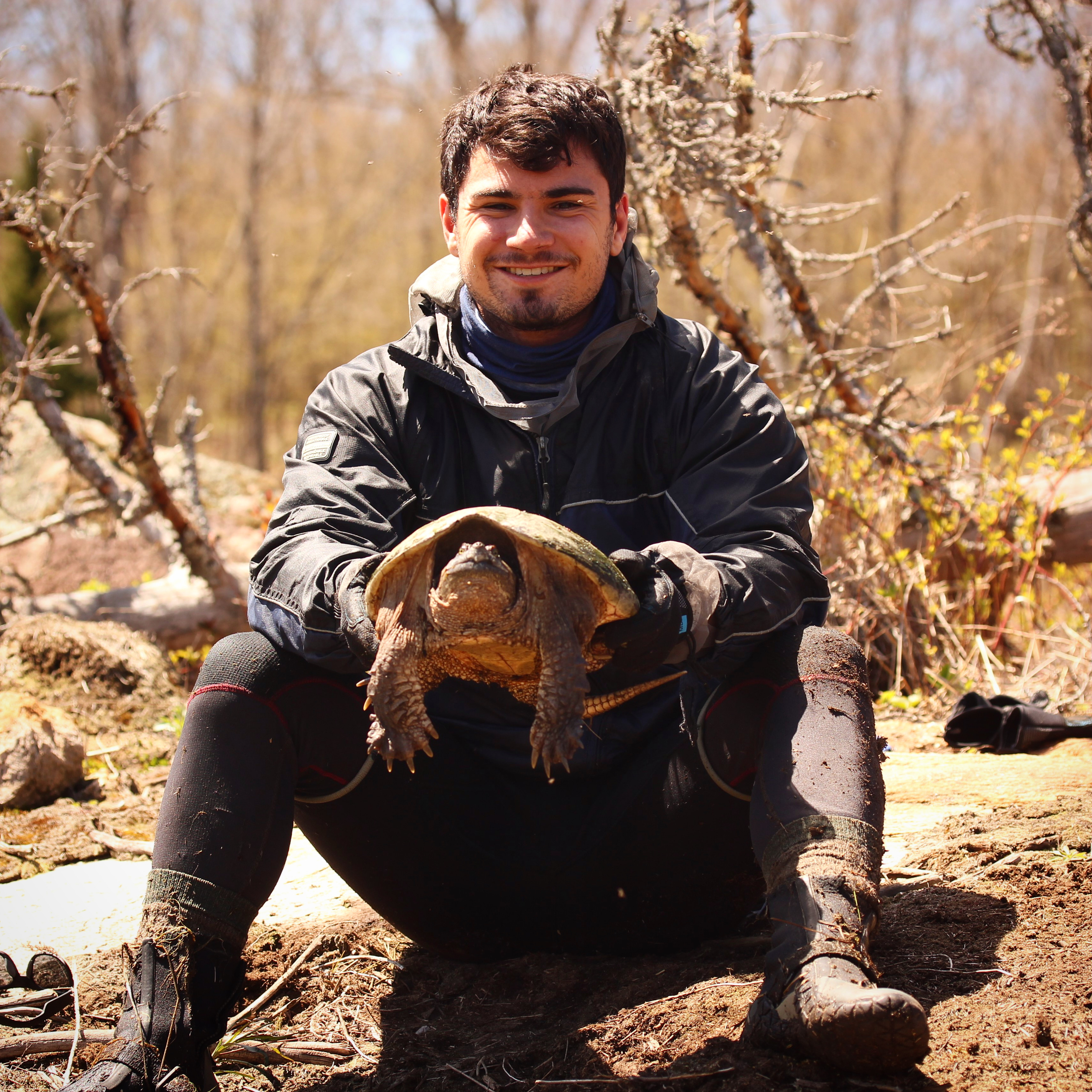 Student holding snapping turtle