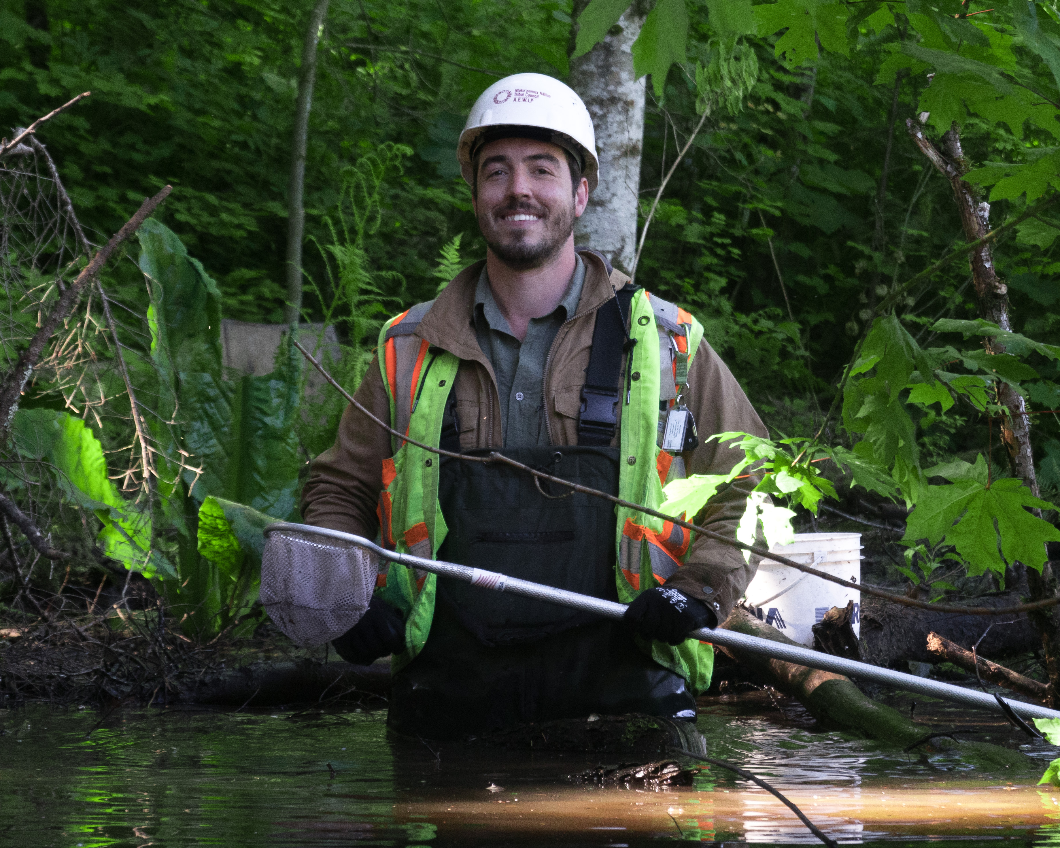 Student with dip net sampler