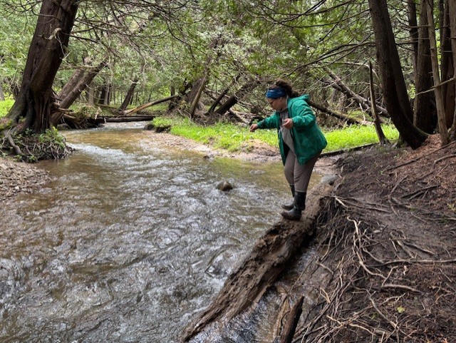 student monitoring river