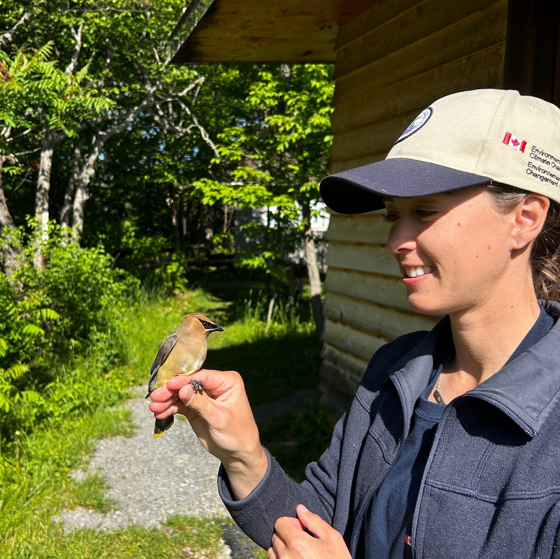 student holding bird