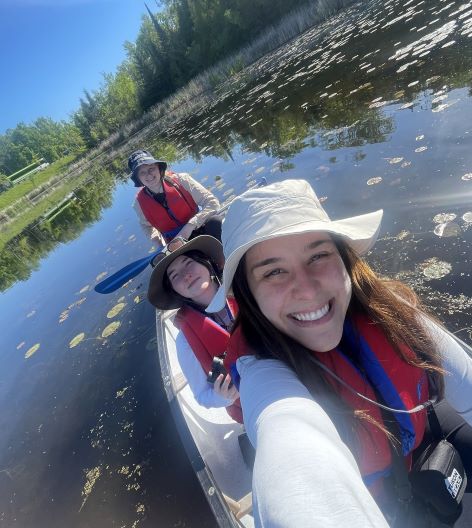 student in canoe