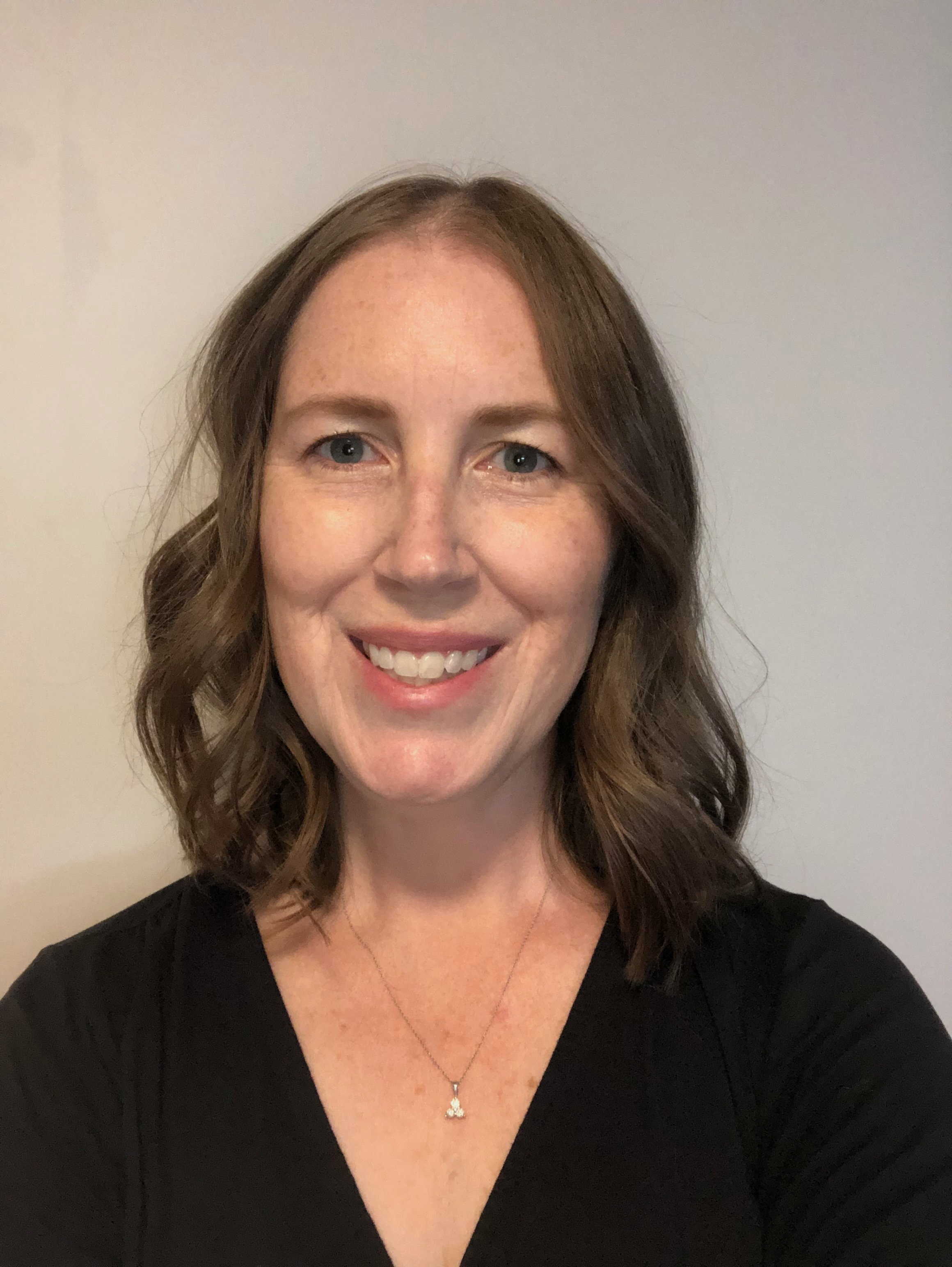 Amy Greer smiling at the camera  