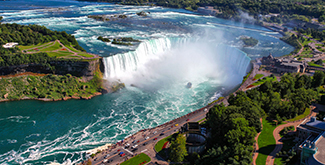 Aerial view of Niagara Falls in the summer sun