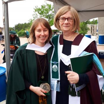 Maddy MacNab MA'18 with Director Joan Sangster at convocation in regalia