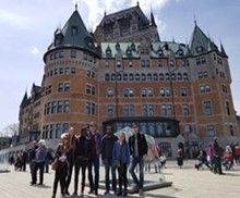 Group of young people in front of old hotel Quebec City