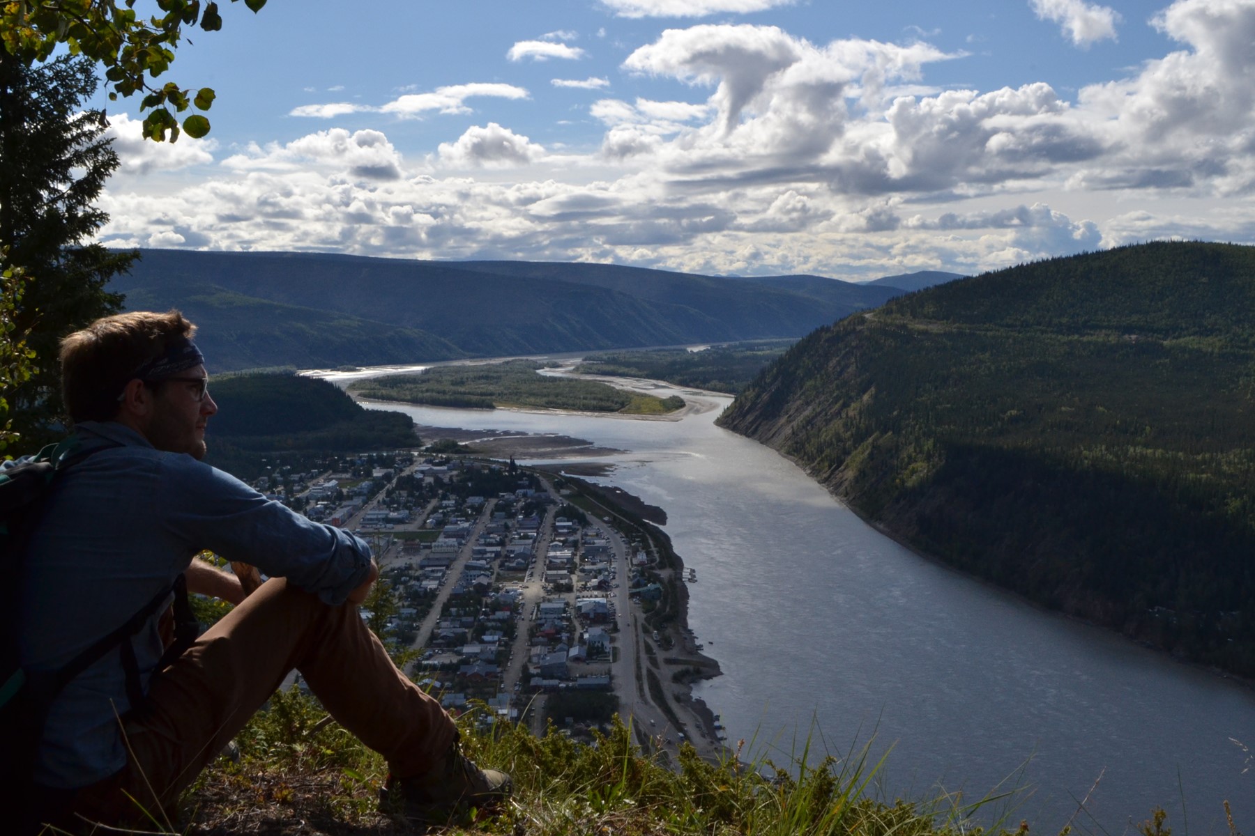person viewing Dawson city from Midnight Dome