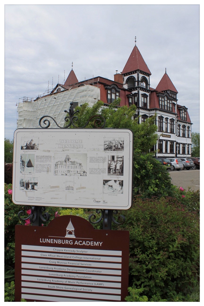 Old grand building with historic plaque for Lunenburg Academy