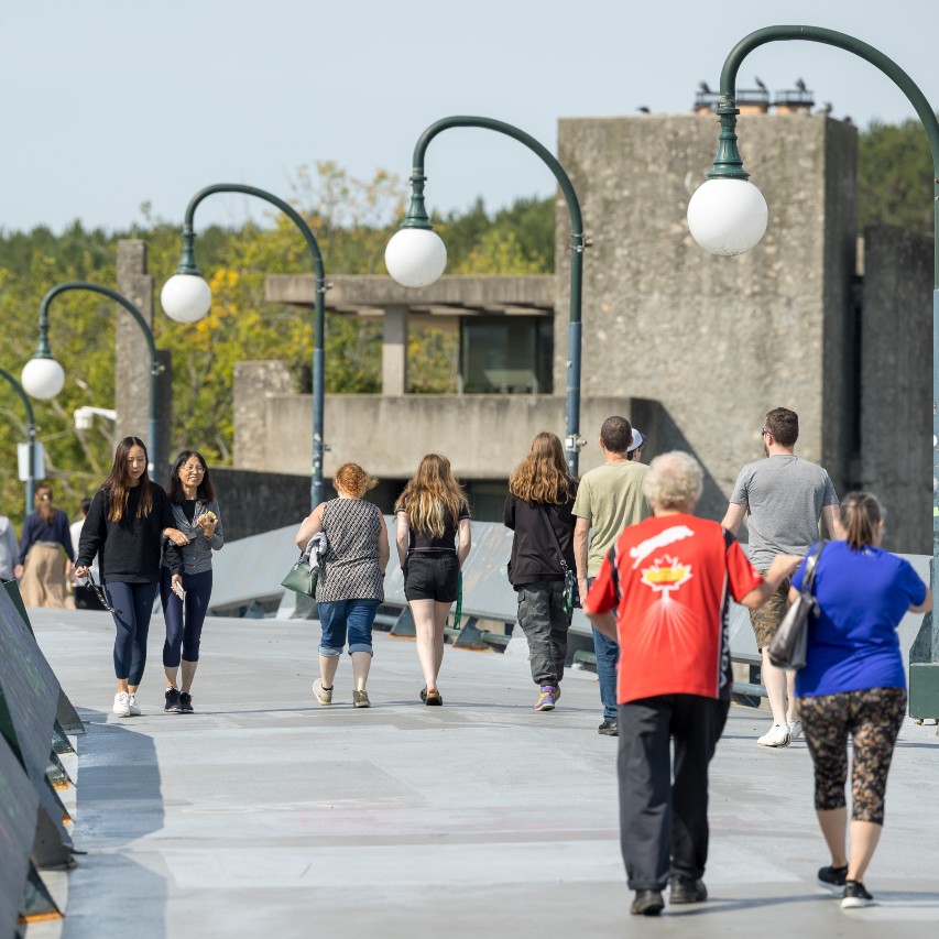People crossing the Faryon Bridge