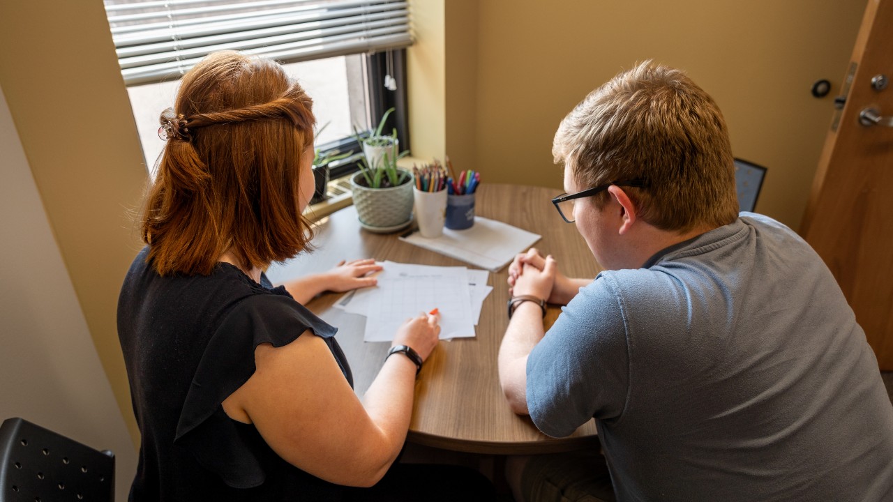 A student meeting with an academic skills instructor