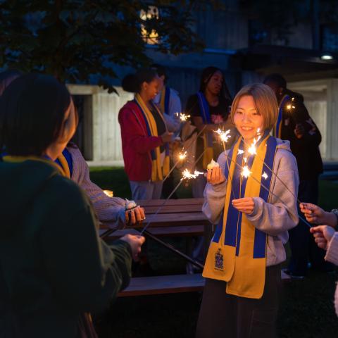 Students at an evening event