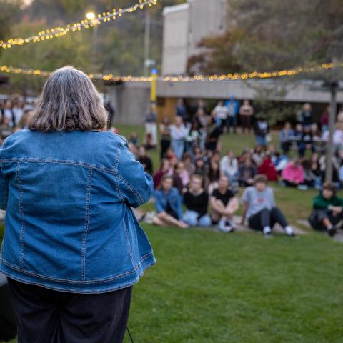 The LEC principal addressing a group of students