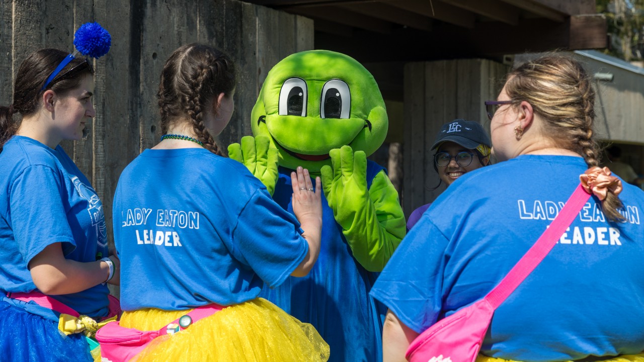 The Toad with three student leaders