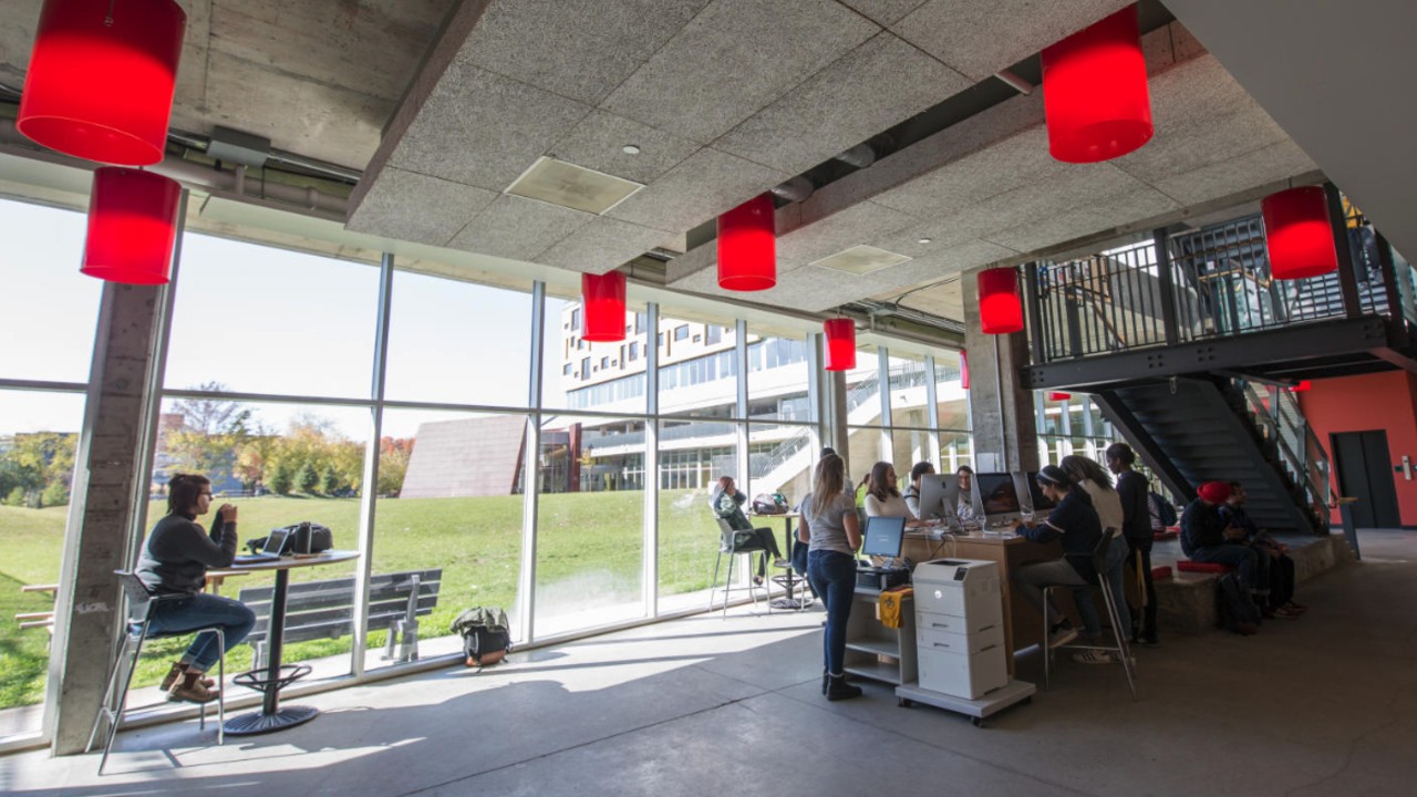 A group of students in the Gzowski Atrium