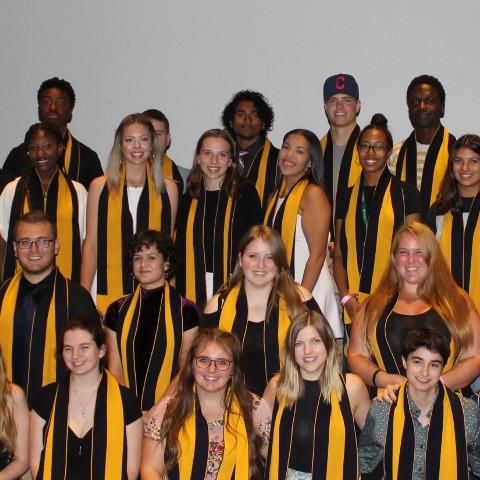 A large group of students wearing Otonabee scarves