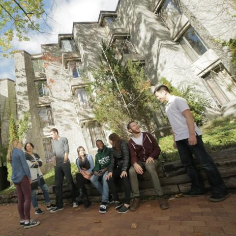 Students sitting outdoors at Champlain