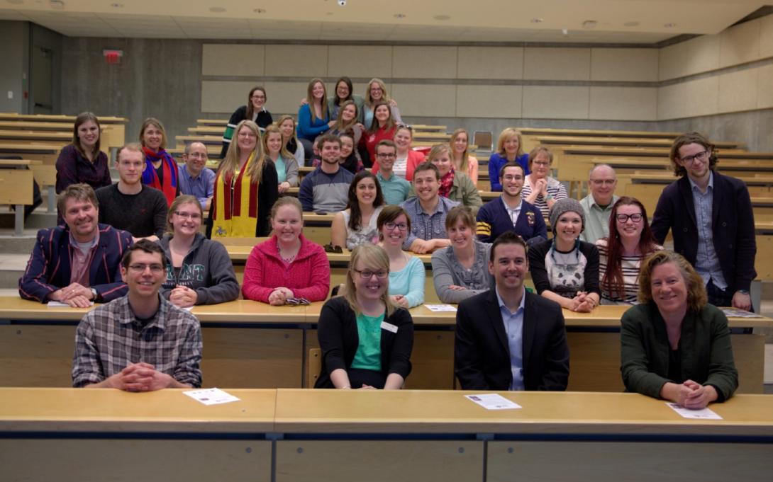A group of staff and students in a Gzowski classroom