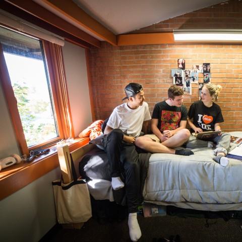 Students in a residence room at Traill