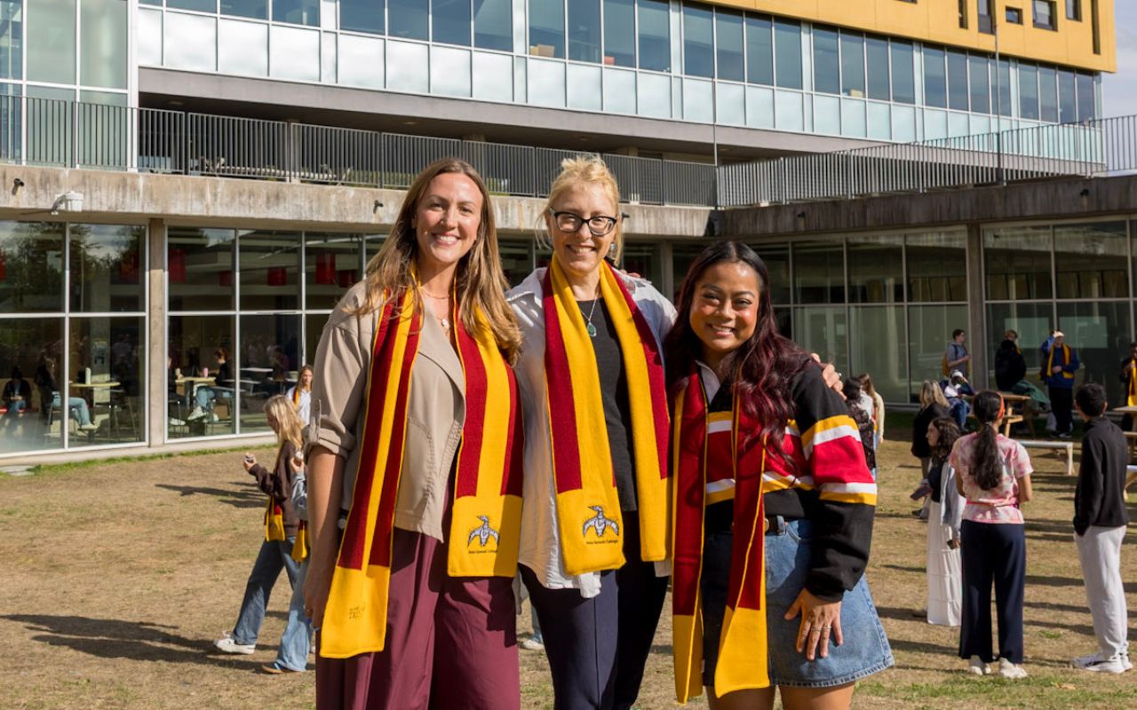 Three women wearing scarves