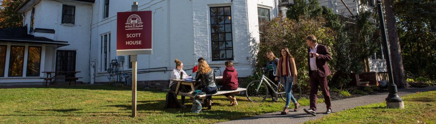 Students studying outside Traill College