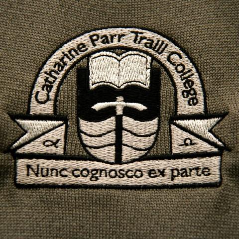 The Catharine Parr Traill College logo embroidered onto a piece of clothing.