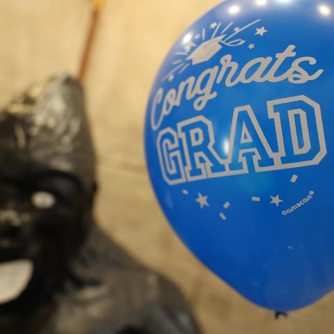 A photo of a balloon saying Congrats Grad