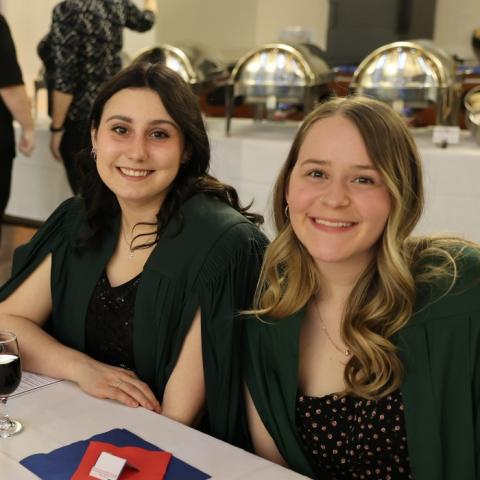 Two students posing for a photo at the Champlain College Awards Dinner