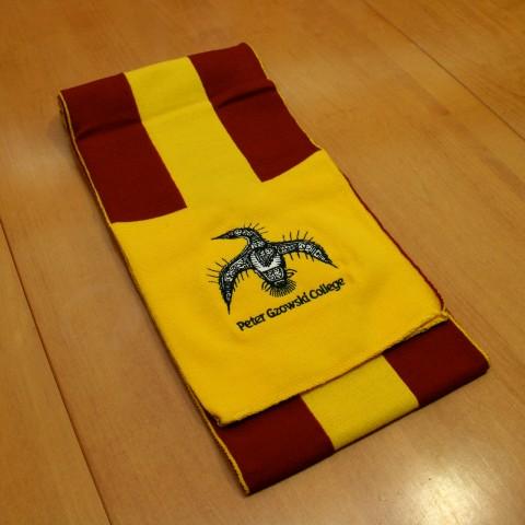 A photo of a Gzowski College scarf on a table.