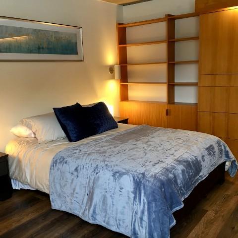A photo of a bedroom in Lady Eaton College's Guest Suites